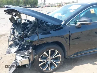 2020 Lexus RX 450h с VIN 2T2HGMDA5LC052075, выставлен на аукционе IAAI как лот 42407001 с пробегом 105 686 миль миль и . История ставок и продаж доступна на DreamBid. Изображение 6.