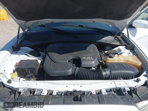 2012 Dodge Charger SE with VIN 2C3CDXBG1CH211300, listed as a IAAI auction lot 42049480 with 156,303 mi miles and . Bid and sale history available at DreamBid. Image 10.