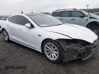 2016 Tesla Model S 90D with VIN 5YJSA1E26GF155962, listed as a IAAI auction lot 41348998 with 134,269 mi miles and . Bid and sale history available at DreamBid. Image 1.