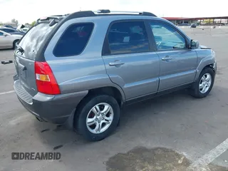 2005 Kia Sportage LX with VIN KNDJE723257122055, listed as a IAAI auction lot 42192102 with 167,726 mi miles and . Bid and sale history available at carsss.com. Image 4.