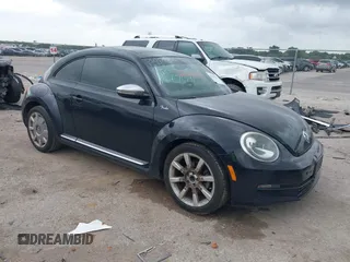 2013 Volkswagen Beetle 2.5L w/Sun with VIN 3VWJP7AT2DM676791, listed as a IAAI auction lot 42527280 with 128,823 mi miles and . Bid and sale history available at DreamBid. Image 1.