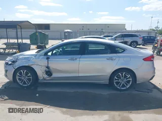 2019 Ford Fusion SEL with VIN 3FA6P0CD2KR116863, listed as a IAAI auction lot 42011256 with 72,676 mi miles. Bid and sale history available at carsss.com. Image 14.