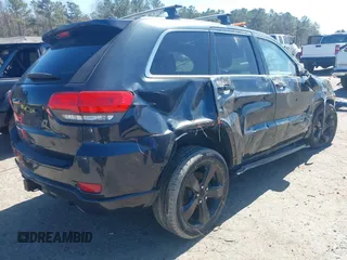 2014 Jeep Grand Cherokee Laredo with VIN 1C4RJEAG0EC580675, listed as a IAAI auction lot 41773879 with 127,714 mi miles. Bid and sale history available at carsss.com. Image 4.