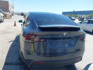 2022 Tesla Model X with VIN 7SAXCAE59NF360301, listed as a IAAI auction lot 41945059 with Not Provided miles and . Bid and sale history available at DreamBid. Image 16.