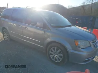2014 Chrysler Town & Country Touring z VIN 2C4RC1BG3ER446333, wystawiony jako IAAI lot #41440744 z przebiegiem 246 838 mil mil oraz . Historia ofert i sprzedaży dostępna na DreamBid. Obrazek 1.