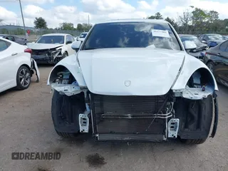 2014 Porsche Cayenne S z VIN WP1AB2A2XELA58986, wystawiony jako IAAI lot #41577501 z przebiegiem 53 672 mil mil oraz . Historia ofert i sprzedaży dostępna na DreamBid. Obrazek 12.