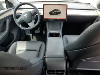 2023 Tesla Model Y Long Range with VIN 7SAYGDEE7PA031199, listed as a Copart auction lot 53876105 with 10,835 mi miles and Salvage Title. Bid and sale history available at DreamBid. Image 8.