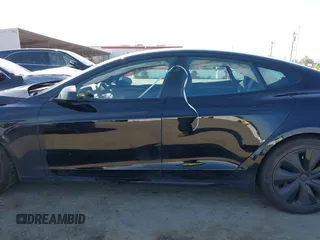 2023 Tesla Model S with VIN 5YJSA1E54PF531021, listed as a IAAI auction lot 42014104 with Not provided miles and . Bid and sale history available at DreamBid. Image 14.