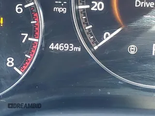 2022 Mazda 3 2.5 Turbo z VIN 3MZBPBAY8NM308426, wystawiony jako IAAI lot #41808563 z przebiegiem 44 693 mil mil oraz . Historia ofert i sprzedaży dostępna na DreamBid. Obrazek 16.