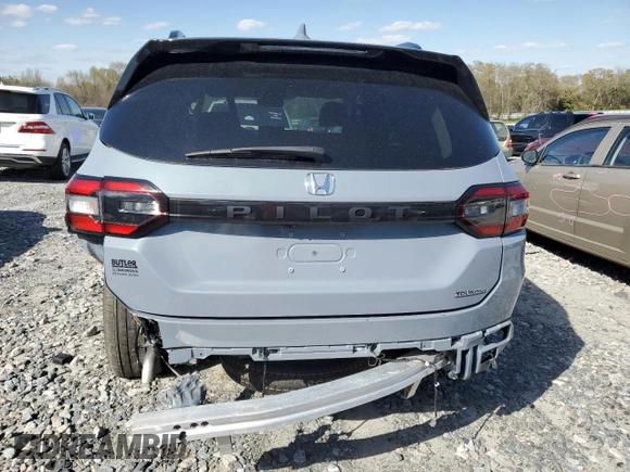 2024 Honda Pilot Touring with VIN 5FNYG2H79RB004803, listed as a Copart auction lot 49702415 with 27,406 mi miles and Salvage title. Bid and sale history available at DreamBid. Image 6.