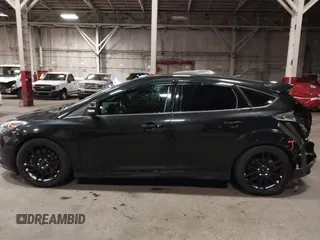 2014 Ford Focus ST with VIN 1FADP3L96EL355713, listed as a IAAI auction lot 41572939 with 102,838 mi miles and . Bid and sale history available at carsss.com. Image 15.