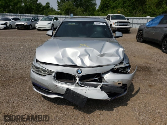 2018 BMW 3 Series 330i xDrive with VIN WBA8D9C54JEM34426, listed as a Copart auction lot 60487205 with 158,224 mi miles and Salvage title. Bid and sale history available at DreamBid. Image 5.