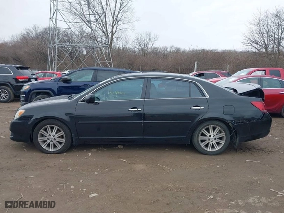 2009 Toyota Avalon XL with VIN 4T1BK36B09U336228, listed as a IAAI auction lot 41070880 with 137,495 mi miles. Bid and sale history available at carsss.com. Image 14.