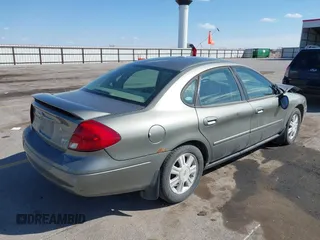 2003 Ford Taurus SES Standard with VIN 1FAFP55283G168564, listed as a IAAI auction lot 41884130 with 199,923 mi miles and . Bid and sale history available at DreamBid. Image 4.