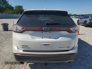 2015 Ford Edge Titanium z VIN 2FMTK4K84FBB64176, wystawiony jako Copart lot #57729005 z przebiegiem 50 654 mil mil oraz Szkoda całkowita • Salvage title. Historia ofert i sprzedaży dostępna na DreamBid. Obrazek 6.
