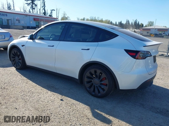 2023 Tesla Model Y Performance with VIN 7SAYGDEF2PF754938, listed as a IAAI auction lot 42067041 with 21,103 mi miles and . Bid and sale history available at DreamBid. Image 3.
