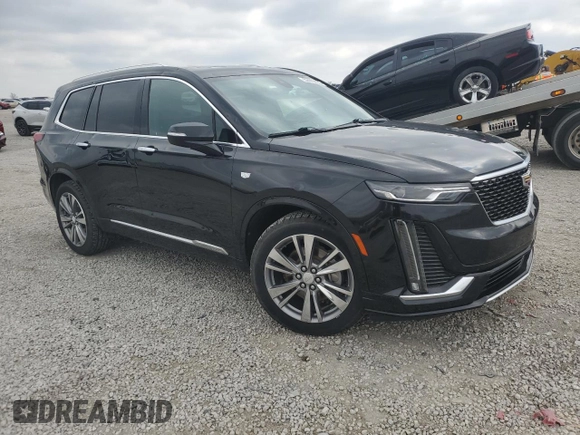 2020 Cadillac XT6 FWD Premium Luxury with VIN 1GYKPCRS2LZ138174, listed as a Copart auction lot 52495655 with 30,822 mi miles and Salvage Title. Bid and sale history available at carsss.com. Image 4.
