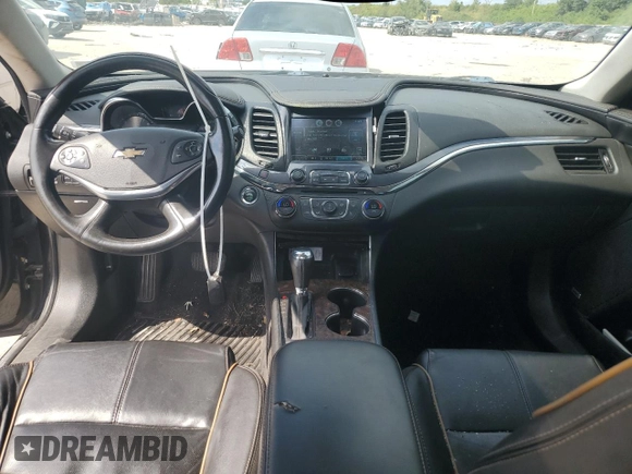 2014 Chevrolet Impala LTZ with VIN 1G1155S38EU169167, listed as a Copart auction lot 73174254 with 156,884 mi miles and Salvage Title. Bid and sale history available at DreamBid. Image 8.