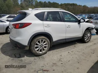2015 Mazda CX-5 Grand Touring with VIN JM3KE4DY0F0458719, listed as a Copart auction lot 52960365 with 128,372 mi miles and Salvage Title. Bid and sale history available at DreamBid. Image 3.