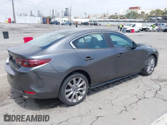 2021 Mazda 3 Preferred with VIN 3MZBPACL4MM214814, listed as a IAAI auction lot 42115140 with 28,860 mi miles and . Bid and sale history available at DreamBid. Image 4.
