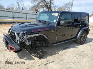 2016 Jeep Wrangler Unlimited Rubicon with VIN 1C4HJWFG4GL107777, listed as a Copart auction lot 48974135 with 118,164 mi miles and Salvage Title. Bid and sale history available at carsss.com. Image 1.