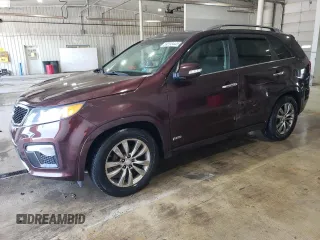 2012 Kia Sorento SX z VIN 5XYKWDA29CG279395, wystawiony jako Copart lot #59293445 z przebiegiem 212 077 mil mil oraz Szkoda całkowita • Salvage title. Historia ofert i sprzedaży dostępna na DreamBid. Obrazek 1.