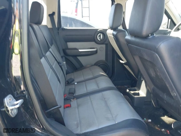 2007 Dodge Nitro SLT with VIN 1D8GU58K87W555759, listed as a IAAI auction lot 41690213 with 196,779 mi miles. Bid and sale history available at carsss.com. Image 8.