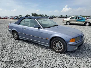 1997 BMW 3-Series 328IC with VIN WBABK832XVET96413, listed as a Copart auction lot 47806025 with 66,051 mi miles and Salvage Title. Bid and sale history available at carsss.com. Image 4.