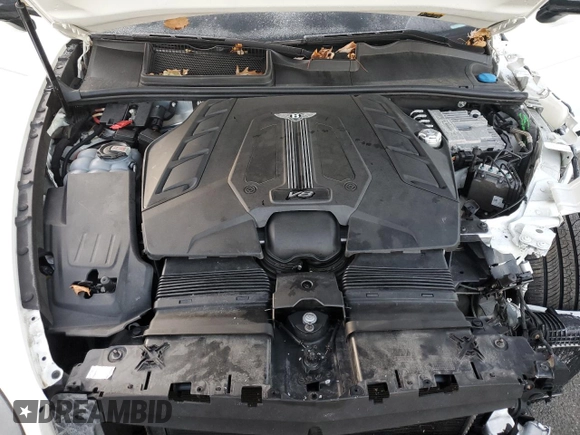 2022 Bentley Bentayga V8 z VIN SJAAM2ZV6NC039590, wystawiony jako Copart lot #85567404 z przebiegiem Nie podano mil oraz Szkoda całkowita • Salvage title. Historia ofert i sprzedaży dostępna na DreamBid. Obrazek 12.