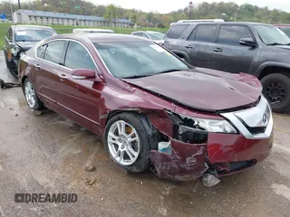 2009 Acura TL Technology z VIN 19UUA86509A023061, wystawiony jako IAAI lot #42044791 z przebiegiem 123 501 mil mil oraz . Historia ofert i sprzedaży dostępna na DreamBid. Obrazek 1.