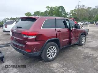 2022 Jeep Grand Cherokee Laredo X with VIN 1C4RJEAG0NC128094, listed as a IAAI auction lot 41402308 with 34,190 mi miles and . Bid and sale history available at DreamBid. Image 4.