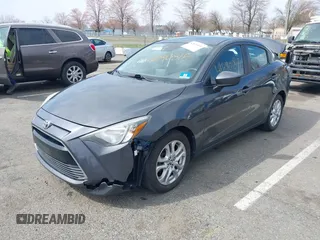2018 Toyota Yaris with VIN 3MYDLBYV2JY321213, listed as a IAAI auction lot 41890815 with 94,089 mi miles and . Bid and sale history available at DreamBid. Image 17.