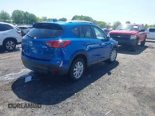 2013 Mazda CX-5 Touring with VIN JM3KE2CE4D0121155, listed as a IAAI auction lot 41983002 with 146,367 mi miles. Bid and sale history available at carsss.com. Image 4.