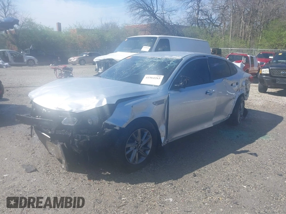 2019 Kia Optima LX with VIN 5XXGT4L36KG292810, listed as a IAAI auction lot 41964263 with 102,898 mi miles. Bid and sale history available at carsss.com. Image 2.