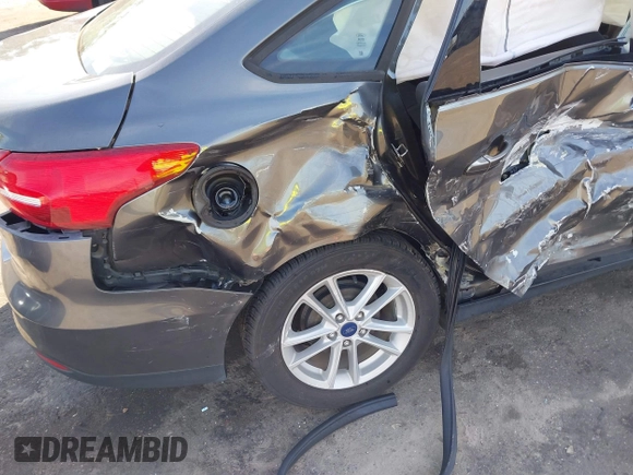2017 Ford Focus SE with VIN 1FADP3F2XHL312253, listed as a IAAI auction lot 41480167 with 86,459 mi miles. Bid and sale history available at carsss.com. Image 6.