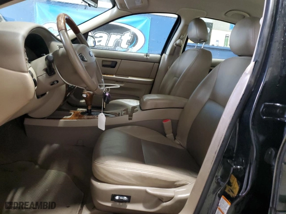 2003 Ford Taurus SEL Deluxe with VIN 1FAHP56S83A235786, listed as a Copart auction lot 45694135 with 80,251 mi miles and Salvage Title. Bid and sale history available at carsss.com. Image 7.