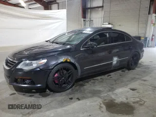 2010 Volkswagen CC Luxury z VIN WVWHP7AN4AE561713, wystawiony jako Copart lot #59707665 z przebiegiem Nie podano mil oraz Czysty tytuł • Clean title. Historia ofert i sprzedaży dostępna na DreamBid. Obrazek 1.