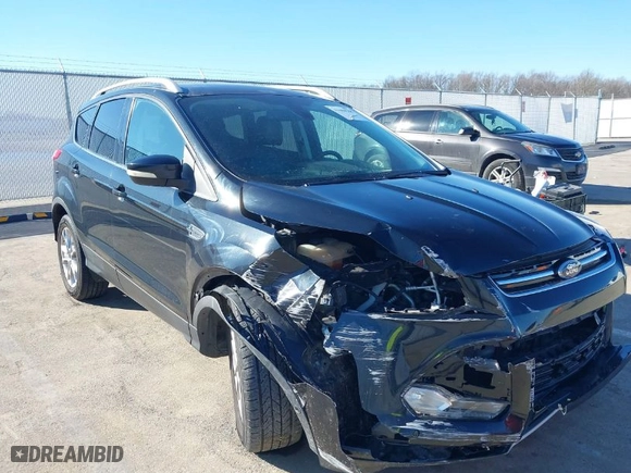 2015 Ford Escape Titanium with VIN 1FMCU0JX7FUA76731, listed as a IAAI auction lot 41684588 with 87,824 mi miles. Bid and sale history available at carsss.com. Image 6.