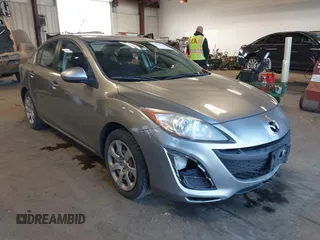 2011 Mazda Mazda3 i Sport with VIN JM1BL1UG2B1492573, listed as a IAAI auction lot 41718773 with 151,593 mi miles. Bid and sale history available at carsss.com. Image 1.