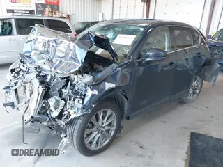 2020 Mazda CX-5 Grand Touring with VIN JM3KFBDM8L0781491, listed as a IAAI auction lot 39788385 with 57,316 mi miles and . Bid and sale history available at carsss.com. Image 2.
