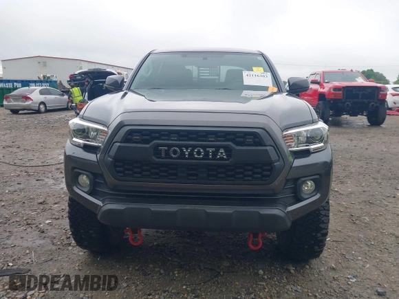 2017 Toyota Tacoma SR5 z VIN 3TMAZ5CN9HM044182, wystawiony jako IAAI lot #42116303 z przebiegiem 92 577 mil mil oraz . Historia ofert i sprzedaży dostępna na DreamBid. Obrazek 12.