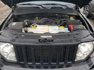 2012 Jeep Liberty Sport z VIN 1C4PJMAKXCW186540, wystawiony jako Copart lot #57848545 z przebiegiem 97 971 mil mil oraz Szkoda całkowita • Salvage title. Historia ofert i sprzedaży dostępna na DreamBid. Obrazek 11.
