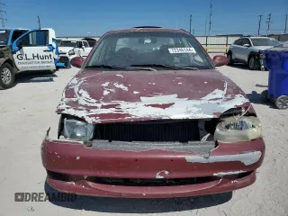 2001 Kia Sephia z VIN KNAFB121115074609, wystawiony jako Copart lot #72346144 z przebiegiem 88 400 mil mil oraz Tytuł czysty. Historia ofert i sprzedaży dostępna na DreamBid. Obrazek 5.
