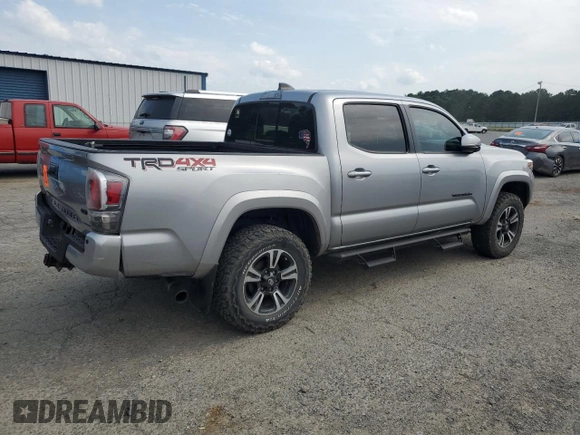 2020 Toyota Tacoma SR5 z VIN 3TMCZ5AN7LM302123, wystawiony jako Copart lot #57299805 z przebiegiem 43 244 mil mil oraz Szkoda całkowita • Salvage title. Historia ofert i sprzedaży dostępna na DreamBid. Obrazek 3.