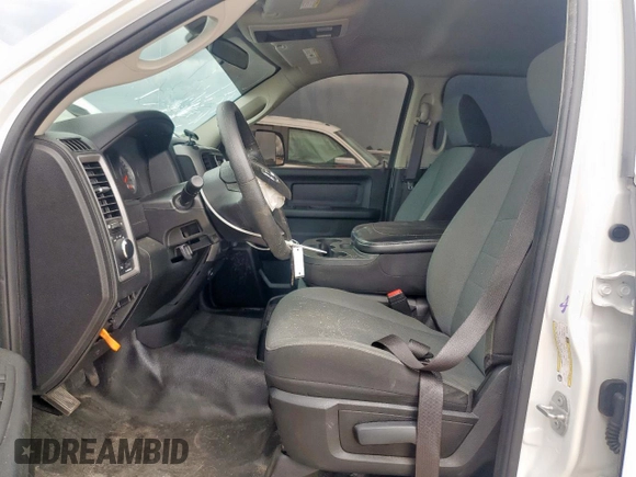 2022 Ram 1500 Tradesman with VIN 3C6RR6KT8NG187621, listed as a Copart auction lot 61386335 with 60,797 mi miles and Salvage title. Bid and sale history available at DreamBid. Image 7.