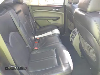 2011 Cadillac SRX Premium Collection z VIN 3GYFNFEYXBS599279, wystawiony jako IAAI lot #42372367 z przebiegiem 97 888 mil mil oraz . Historia ofert i sprzedaży dostępna na DreamBid. Obrazek 8.