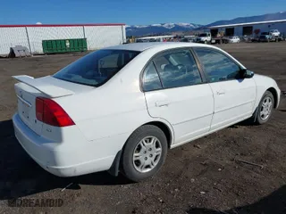 2002 Honda Civic LX with VIN 2HGES16672H596631, listed as a IAAI auction lot 41703532 with 172,311 mi miles. Bid and sale history available at carsss.com. Image 4.