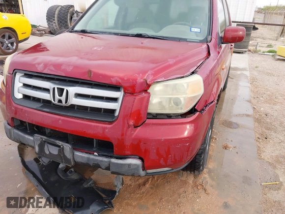 2006 Honda Pilot EX with VIN 5FNYF28476B025864, listed as a IAAI auction lot 41878122 with Not Provided miles and . Bid and sale history available at DreamBid. Image 6.