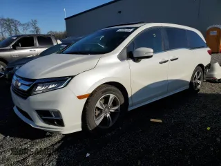 2018 Honda Odyssey Touring с VIN 5FNRL6H8XJB002031, выставлен на аукционе Copart как лот 49996105 с пробегом 202 284 миль миль и Чистый • Clean title. История ставок и продаж доступна на DreamBid. Изображение 1.