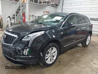 2022 Cadillac XT5 FWD Luxury with VIN 1GYKNAR47NZ100356, listed as a IAAI auction lot 42393314 with 91,492 mi miles and . Bid and sale history available at DreamBid. Image 2.